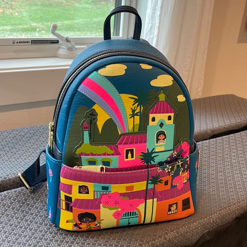 NEW WITH TAGS: Limited Edition ENCANTO Lounge Fly Backpack. Purchased in-park.